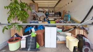 Long-distance moving truck packed with contents of a three-bedroom home.